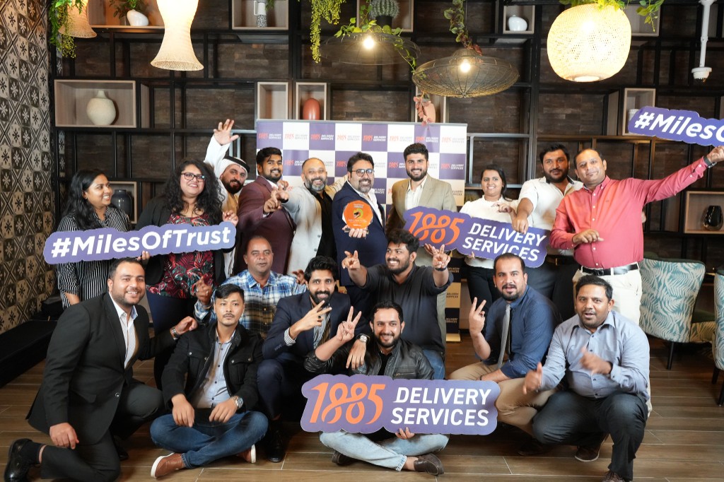 1885 Delivery Services team celebrating with #MilesOfTrust